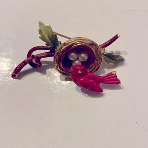 Florenza red cardinal trembler on nest of three pearl eggs with branch enameled